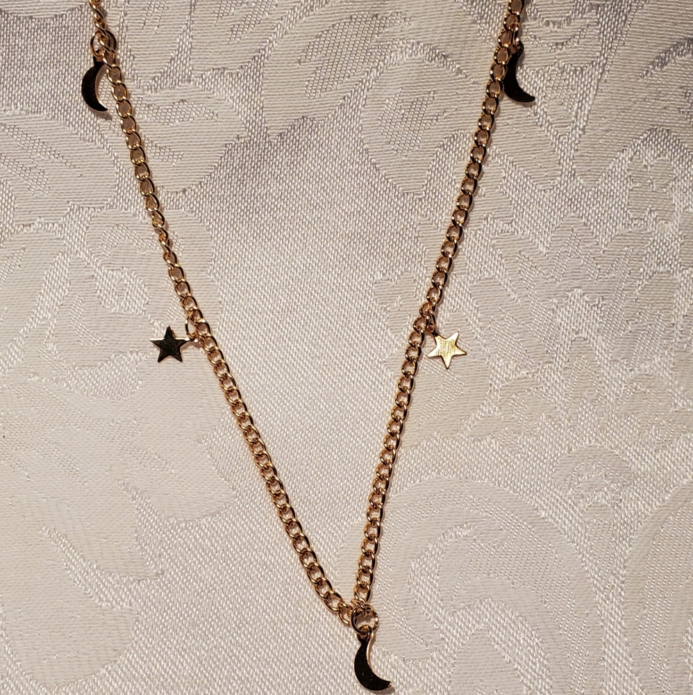 Gold moon and star necklace